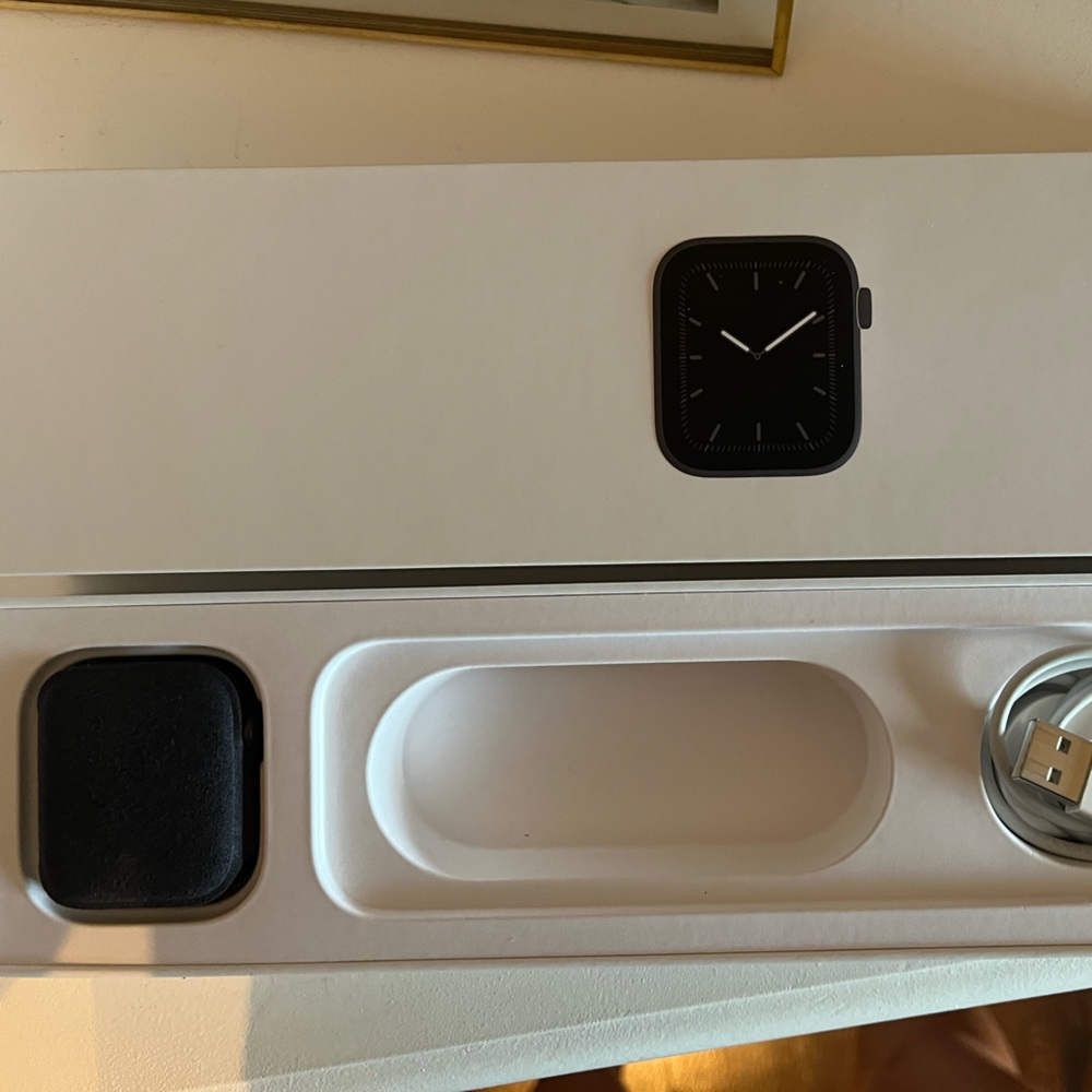 Series 5 Apple Watch. Space Gray Aluminum Case. Black Sport Band.